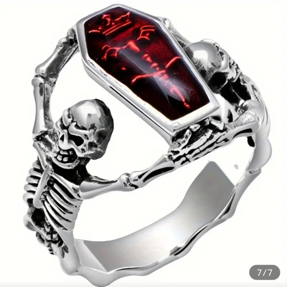 Skeleton Ring with Synthetic Red Zirconia and Alloy Band.